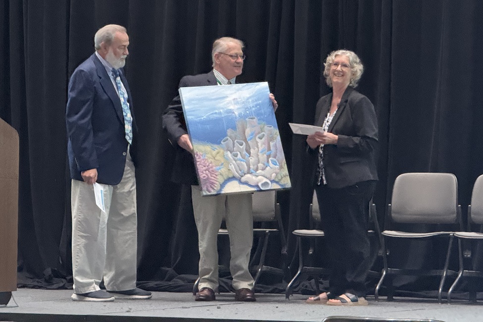 wright-farnsworth Wright receives the Farnsworth Award artwork at the 2025 ASP Annual Meeting.